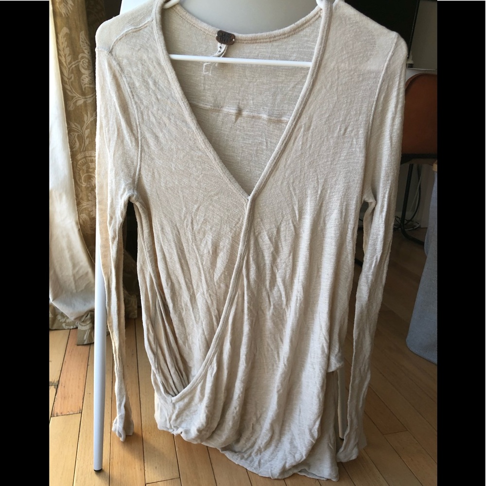 Free people cream colored drapey shirt. S